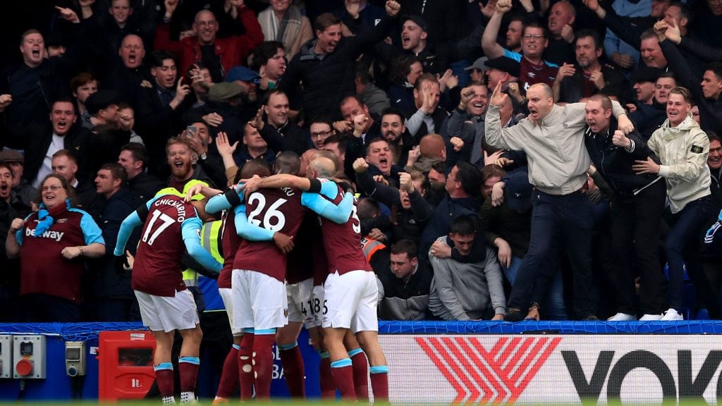 LONDON, ENGLAND - APRIL 08: West Ham fans celebrate the equalising goal from Javier Hernandez during the Premier League match between Chelsea and West Ham United at Stamford Bridge on April 8, 2018 in London, England. (Photo by Marc Atkins/Offside/Getty Images)