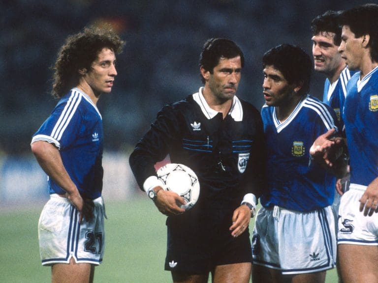 08 July 1990 Rome: FIFA World Cup Final ; Argentina v West Germany - referee CODESAL MENDEZ Edgardo is confronted by Argentinian players including captain Diego Maradona and Pedro Troglio(Photo by Mark Leech/Offside/Getty Images).