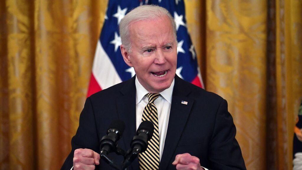 US President Joe Biden speaks during an event celebrating the reauthorization of the Violence Against Women Act, in the East Room of the White House in Washington, DC, on March 16, 2022. (Photo by Nicholas Kamm / AFP) (Photo by NICHOLAS KAMM/AFP via Getty Images)