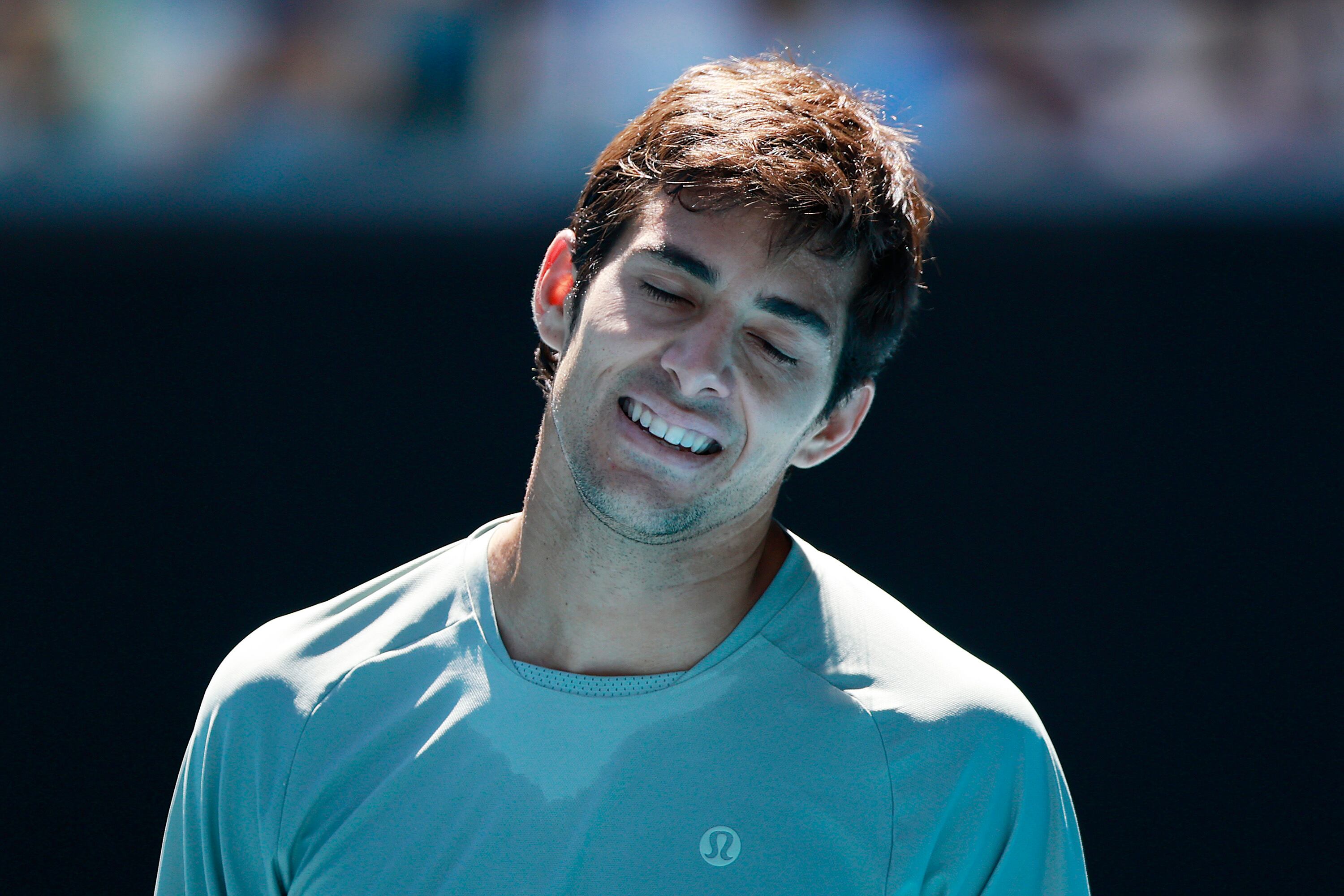 MELBOURNE, AUSTRALIA - JANUARY 16: Cristian Garin of Chile reacts in the Men's Singles Second Round match against Taylor Fritz of the United States during day five of the 2025 Australian Open at Melbourne Park on January 16, 2025 in Melbourne, Australia. (Photo by Darrian Traynor/Getty Images)