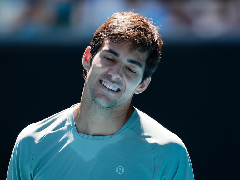MELBOURNE, AUSTRALIA - JANUARY 16: Cristian Garin of Chile reacts in the Men's Singles Second Round match against Taylor Fritz of the United States during day five of the 2025 Australian Open at Melbourne Park on January 16, 2025 in Melbourne, Australia. (Photo by Darrian Traynor/Getty Images)