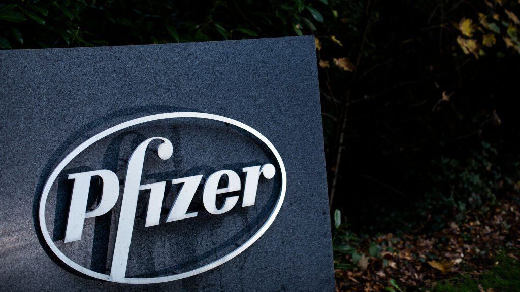 TADWORTH, ENGLAND - NOVEMBER 10: A general view of the Pfizer Headquarters sign on November 10, 2020 in Tadworth, England. Opened in 2002, the 320-acre site houses the company's UK commercial headquarters. According to the Pfizer website, the location's approximately 700 employees work in business-support functions, such finance or HR, and European business operations. The American pharmaceutical company recently announced its novel coronavirus vaccine, developed with German firm BioNTech, was 90% effective in trials. (Photo by Dan Kitwood/Getty Images)
