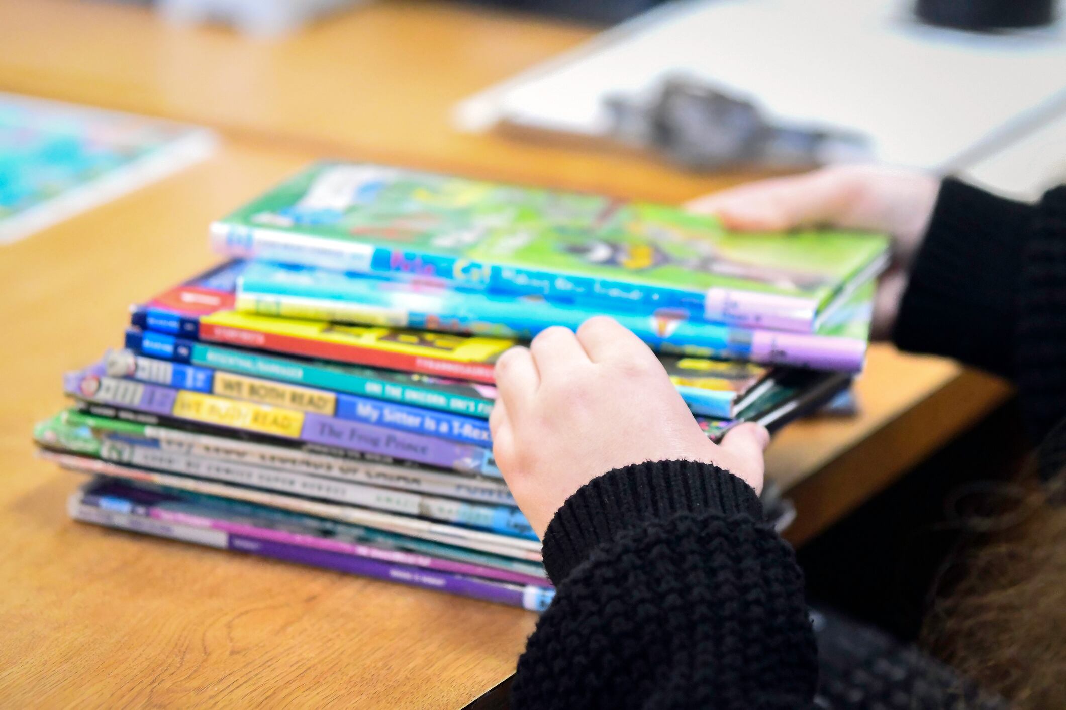 Image of a librarian's hands as she sorts