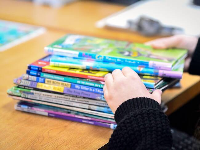 Image of a librarian's hands as she sorts