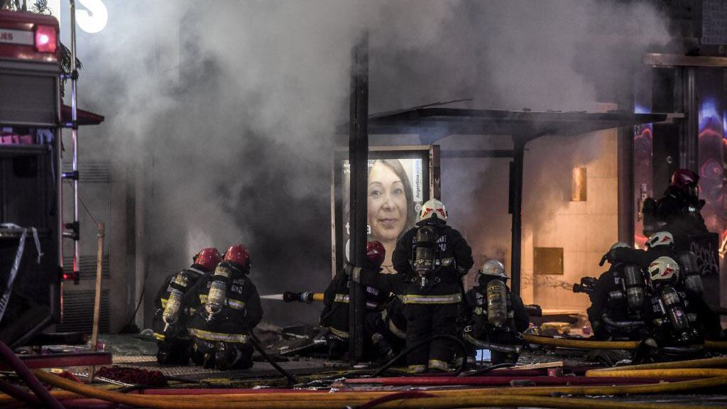 Picture released by Agencia Telam showing firefighters putting out a fire after two explosions at a perfume store killed two firemen and injured 15 others, in Buenos Aires, on June 2, 2020. - Two firefighters died and 15 others suffered injuries from two explosions at the time they were fighting a fire in the perfume store in Buenos Aires, sources from the emergency service reported. (Photo by FERNANDO GENS / TELAM / AFP) / Argentina OUT / RESTRICTED TO EDITORIAL USE - MANDATORY CREDIT "AFP PHOTO/ TELAM / FERNANDO GENS" - NO MARKETING NO ADVERTISING CAMPAIGNS - DISTRIBUTED AS A SERVICE TO CLIENTS (Photo by FERNANDO GENS/TELAM/AFP via Getty Images)