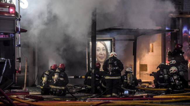 Picture released by Agencia Telam showing firefighters putting out a fire after two explosions at a perfume store killed two firemen and injured 15 others, in Buenos Aires, on June 2, 2020. - Two firefighters died and 15 others suffered injuries from two explosions at the time they were fighting a fire in the perfume store in Buenos Aires, sources from the emergency service reported. (Photo by FERNANDO GENS / TELAM / AFP) / Argentina OUT / RESTRICTED TO EDITORIAL USE - MANDATORY CREDIT "AFP PHOTO/ TELAM / FERNANDO GENS" - NO MARKETING NO ADVERTISING CAMPAIGNS - DISTRIBUTED AS A SERVICE TO CLIENTS (Photo by FERNANDO GENS/TELAM/AFP via Getty Images)