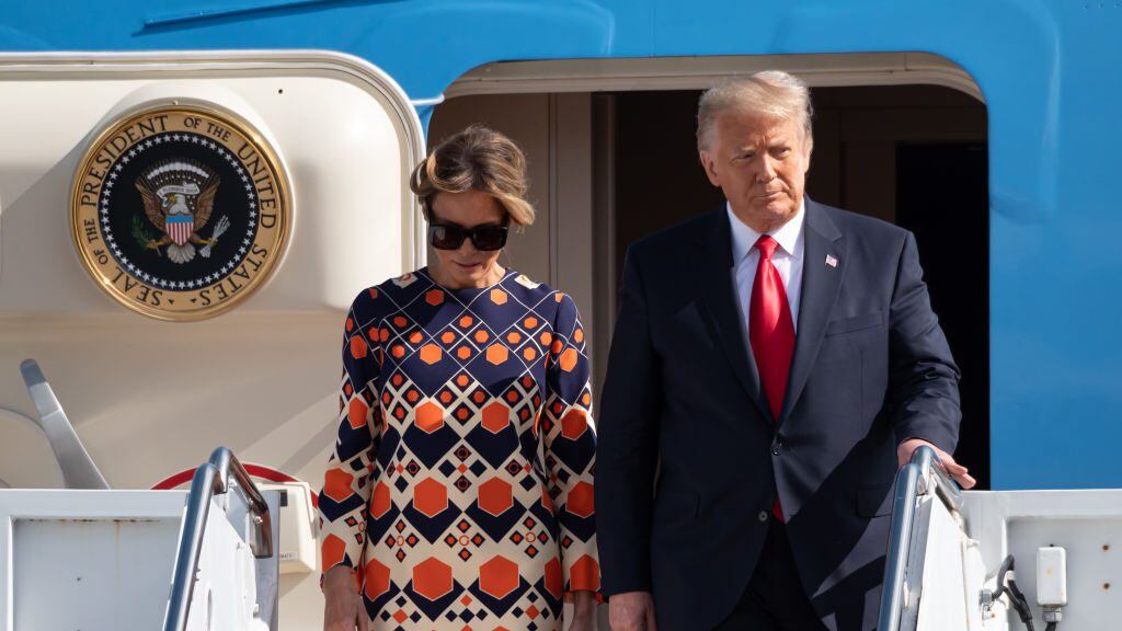 WEST PALM BEACH, FLORIDA - JANUARY 20: Outgoing U.S. President Donald Trump and First Lady Melania Trump exit Air Force One at the Palm Beach International Airport on the way to Mar-a-Lago Club on January 20, 2020 in West Palm Beach, Florida. Trump left Washington, DC on the last day of his administration before Joe Biden was sworn-in as the 46th president of the United States. (Photo by Noam Galai/Getty Images)