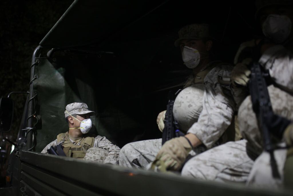SANTIAGO, CHILE - MARCH 22: Military forces are seen over the streets of Santiago as curfew is declared by authorities after more than 600 cases and the first death of coronavirus (Covid-19) were announced in Chile on March 22, 2020. (Photo by Cristobal Saavedra Vogel/Anadolu Agency via Getty Images)