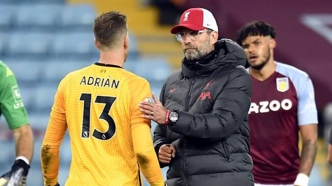 Liverpool manager Jurgen Klopp and goalkeeper Adrian after the Premier League match at Villa Park, Birmingham. (Photo by Peter Powell/PA Images via Getty Images)