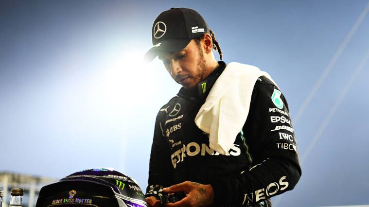 BAHRAIN, BAHRAIN - NOVEMBER 29: Race winner Lewis Hamilton of Great Britain and Mercedes GP looks on in parc ferme during the F1 Grand Prix of Bahrain at Bahrain International Circuit on November 29, 2020 in Bahrain, Bahrain. (Photo by Clive Mason - Formula 1/Formula 1 via Getty Images)