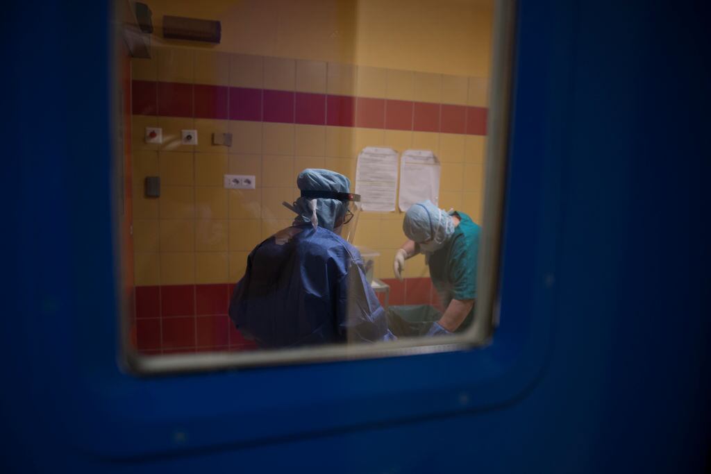 TURIN, ITALY - APRIL 21: Nurses change clothes in the uncontaminated area after working a shift at Maria Pia Hospital on April 21, 2020 in Turin, Italy. Italy is still in lockdown in an attempt to slow the spread of the coronavirus. (Photo by Stefano Guidi/Getty Images)