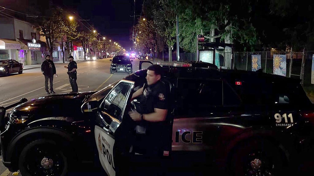 This image grab from an AFPTV footage shows Police officers operating at the site where a car ploughed into a street party in Vancouver on April 26, 2025. Vancouver police said they did not suspect "an act of terrorism" after a driver plowed into a street party on April 26, 2025 in the Canadian city, killing a number of people. (Photo by AFPTV teams / AFP) (Photo by AFPTV TEAMS/AFP via Getty Images)