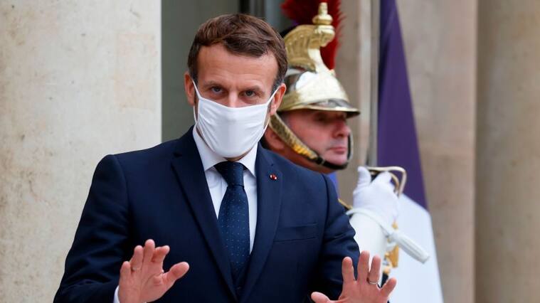 French President Emmanuel Macron gestures as he accompanies out the Estonian prime minister following their meeting at the Elysee Palace in Paris, on October 28, 2020. (Photo by Ludovic MARIN / AFP) (Photo by LUDOVIC MARIN/AFP via Getty Images)