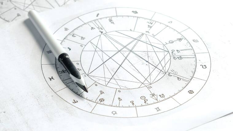 Astrology. Astrologer calculates natal chart and makes a forecast of fate.Tarot cards, Fortune telling on tarot cards magic crystal, occultism, Esoteric background. Fortune telling,tarot predictions.