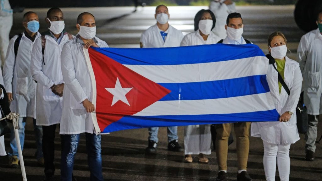 PRETORIA, SOUTH AFRICA - APRIL 27: An SAA flight with a Cuban Health Brigade consisting of 217 Cuban health proffesionals arrives at Waterkloof Airforce Base on April 27, 2020 in Pretoria, South Africa. It is reported that a delegation of more than 200 health professionals from Cuba arrived in South Africa to bolster support in the fight against COVID-19 in South Africa. (Photo by Dino Lloyd/Gallo Images via Getty Images)