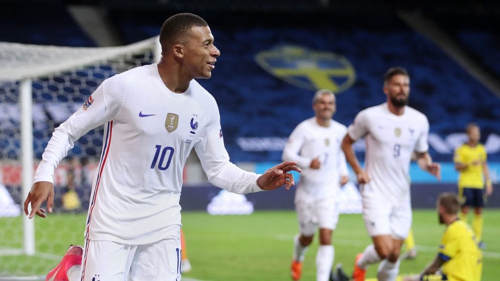 STOCKHOLM, SWEDEN - SEPTEMBER 05: Kylian Mbappe of France celebrates after scoring his team's first goal during the UEFA Nations League group stage match between Sweden and France at Friends Arena on September 05, 2020 in Stockholm, Sweden. (Photo by Linnea Rheborg/Getty Images)