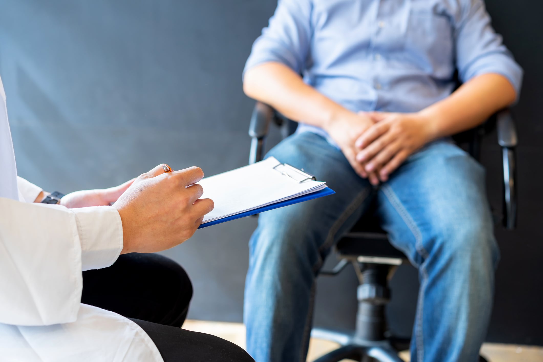Male doctor and prostate cancer patient are discussing about prostate cancer test report. Diagnostic, prevention of men diseases, healthcare, medical service, consultation, healthy lifestyle concept.