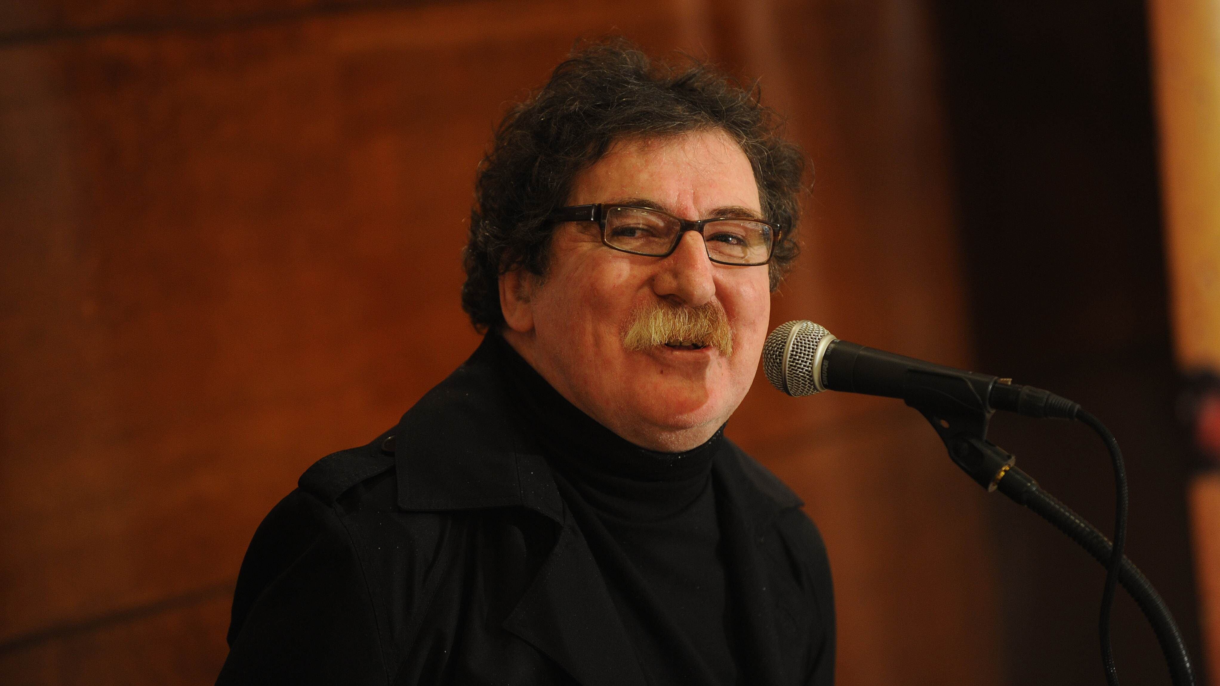 Argentine musician Charly Garcia speaks during a press conference in Montevideo on May 6, 2011. Charly Garcia is in Uruguay to present his most recent show. AFP PHOTO/Pablo PORCIUNCULA (Photo credit should read PABLO PORCIUNCULA/AFP via Getty Images)
