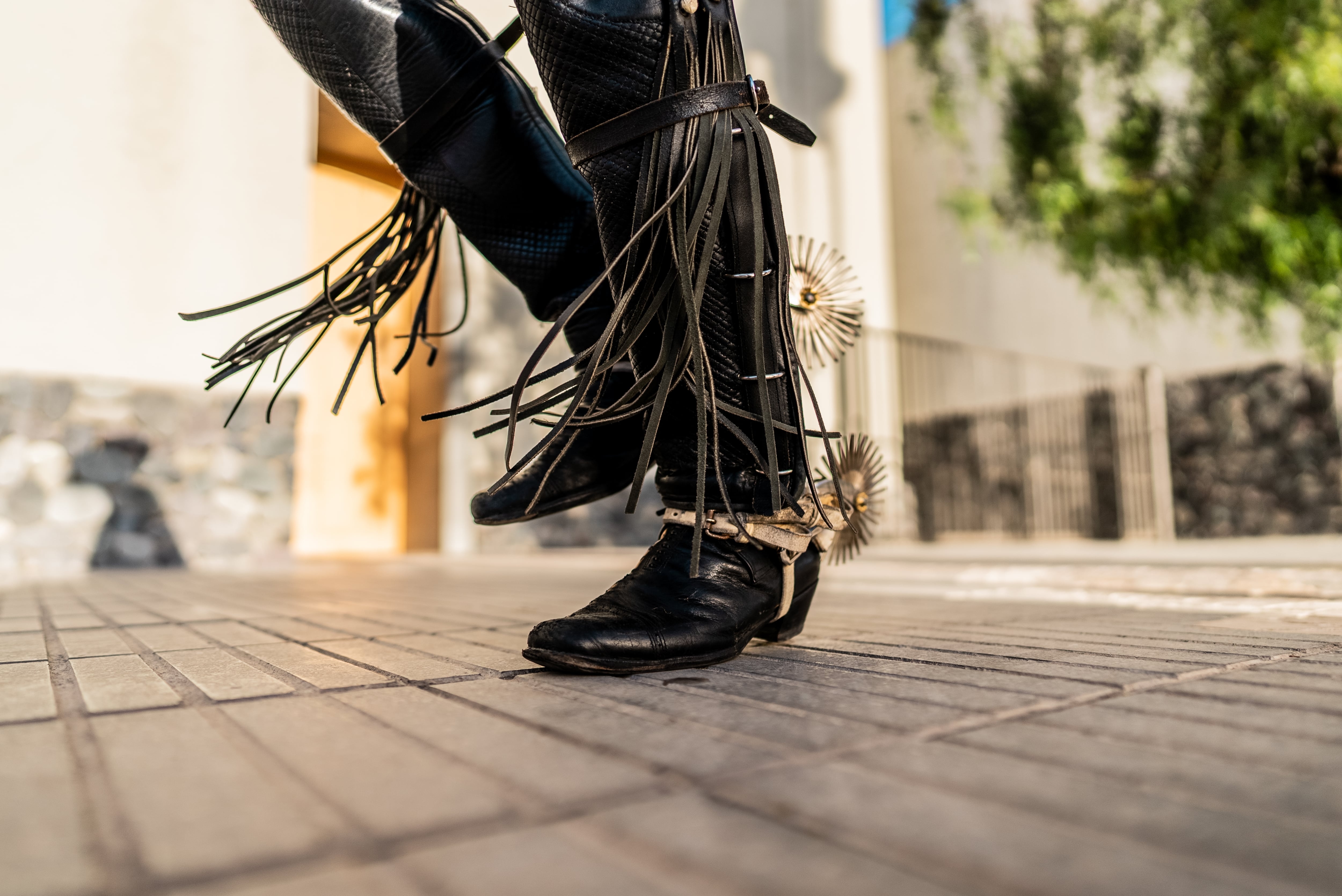 Close-up of the feet of a huaso dancing at a folkloric cueca event