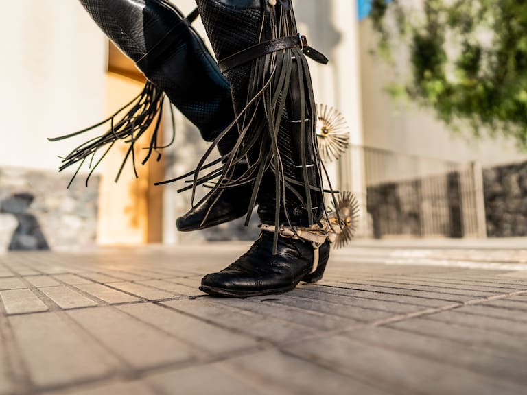 Close-up of the feet of a huaso dancing at a folkloric cueca event