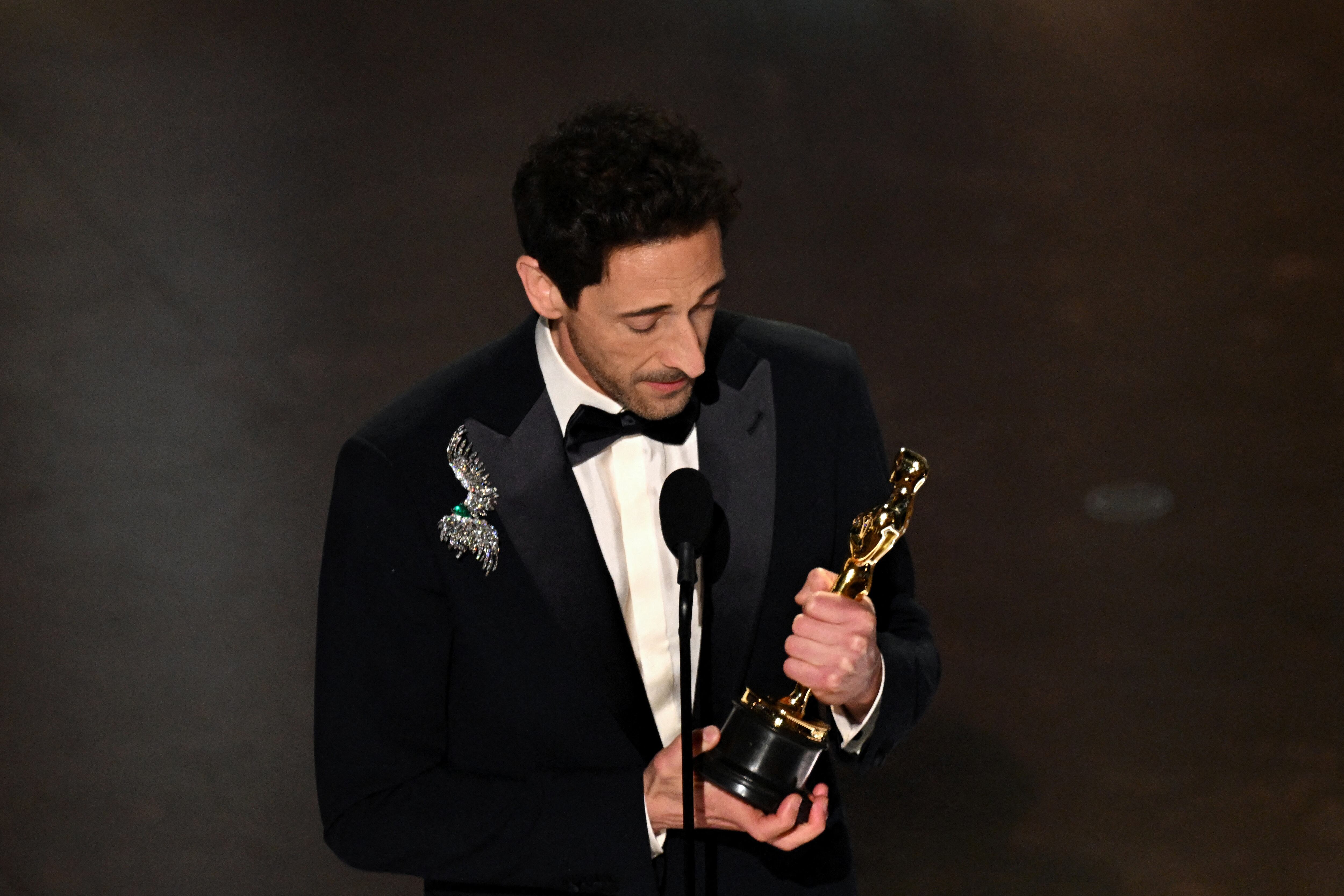 US actor Adrien Brody accepts the award for Best Actor in a Leading Role for "The Brutalist" during the 97th Annual Academy Awards at the Dolby Theatre in Hollywood, California on March 2, 2025. (Photo by Patrick T. Fallon / AFP) (Photo by PATRICK T. FALLON/AFP via Getty Images)