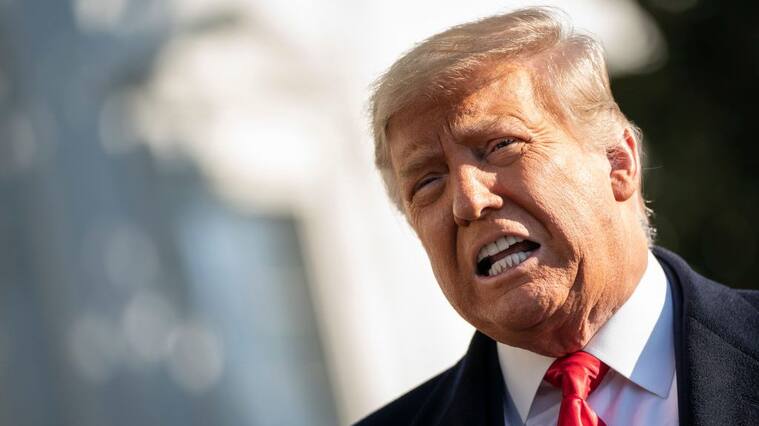 WASHINGTON, DC - JANUARY 12: U.S. President Donald Trump speaks to reporters on the South Lawn of the White House before boarding Marine One on January 12, 2021 in Washington, DC. Following last week's deadly pro-Trump riot at the U.S. Capitol, President Trump is making his first public appearance with a trip to the town of Alamo, Texas to view the construction of the wall along the U.S.-Mexico border. (Photo by Drew Angerer/Getty Images)
