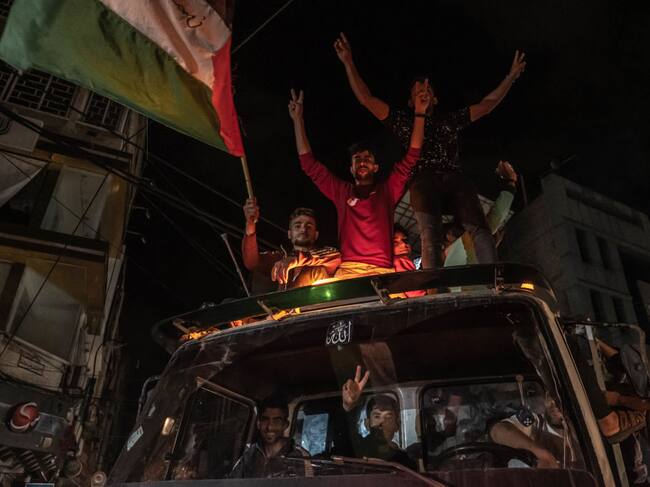 Los palestinos festejan el fin de los bombardeos sobre Gaza