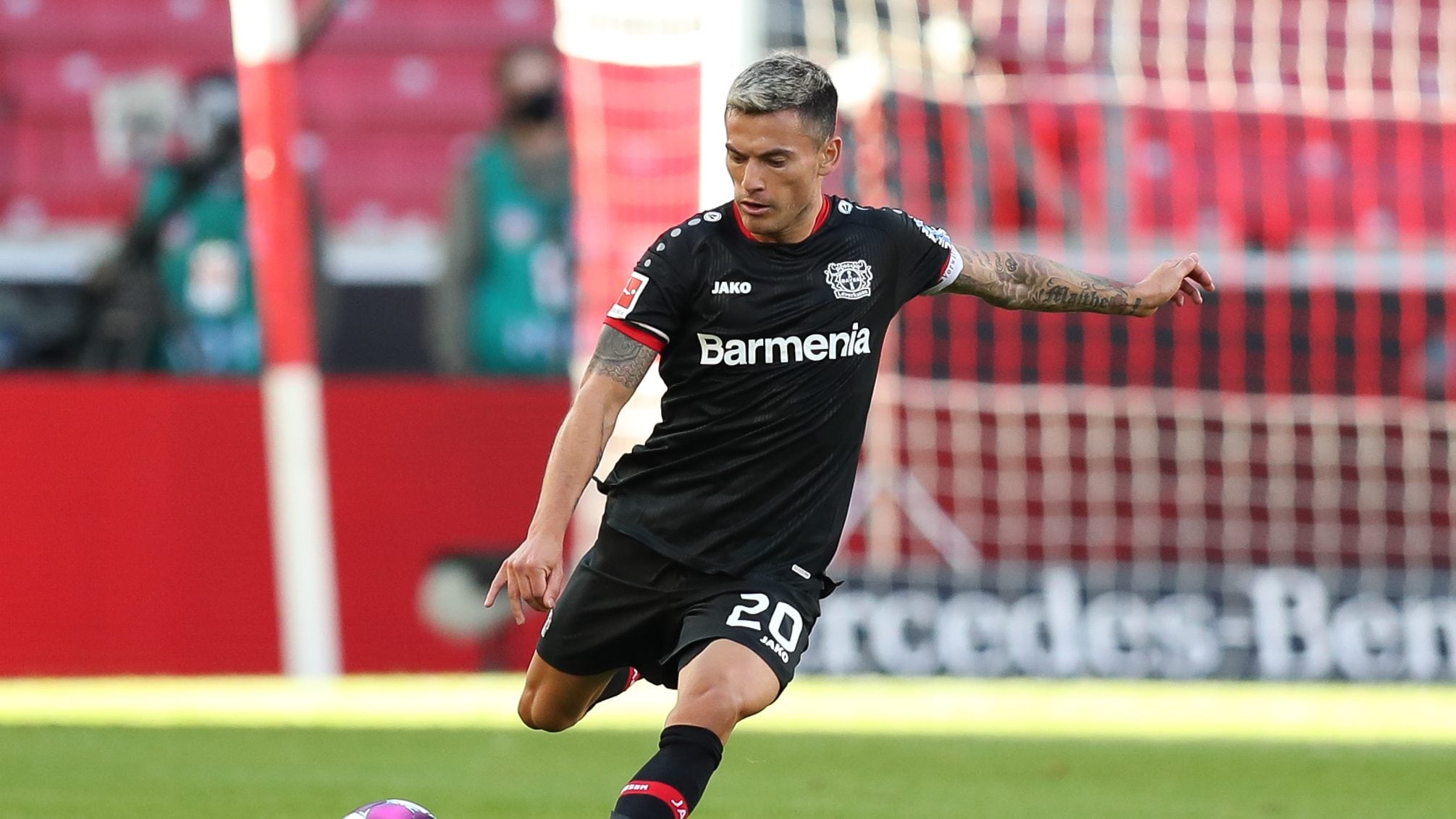03 October 2020, Baden-Wuerttemberg, Stuttgart: Football: Bundesliga, VfB Stuttgart - Bayer Leverkusen, 3rd matchday, Mercedes-Benz Arena. Leverkusen's Charles Aranguiz in action. Photo: Tom Weller/dpa - IMPORTANT NOTE: In accordance with the regulations of the DFL Deutsche Fußball Liga and the DFB Deutscher Fußball-Bund, it is prohibited to exploit or have exploited in the stadium and/or from the game taken photographs in the form of sequence images and/or video-like photo series. (Photo by Tom Weller/picture alliance via Getty Images)