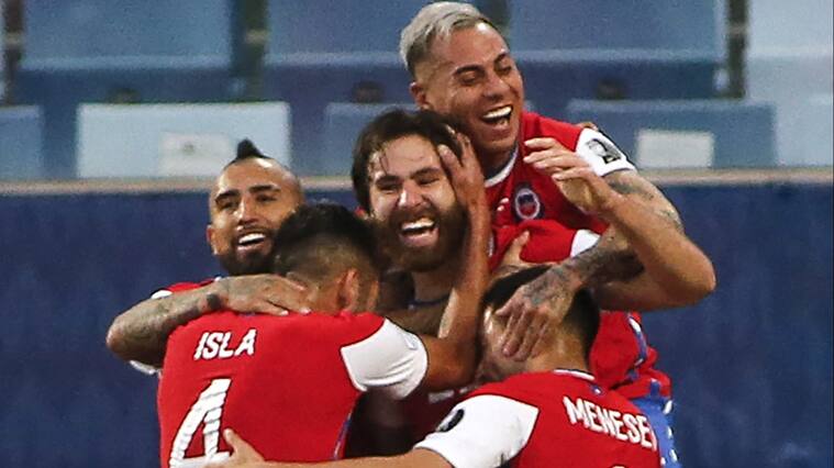 Chile's Ben Brereton (C) celebrates with teammates after scoring against Bolivia during their Conmebol Copa America 2021 football tournament group phase match at the Pantanal Arena in Cuiaba, Brazil, on June 18, 2021. (Photo by SILVIO AVILA / AFP) (Photo by SILVIO AVILA/AFP via Getty Images)