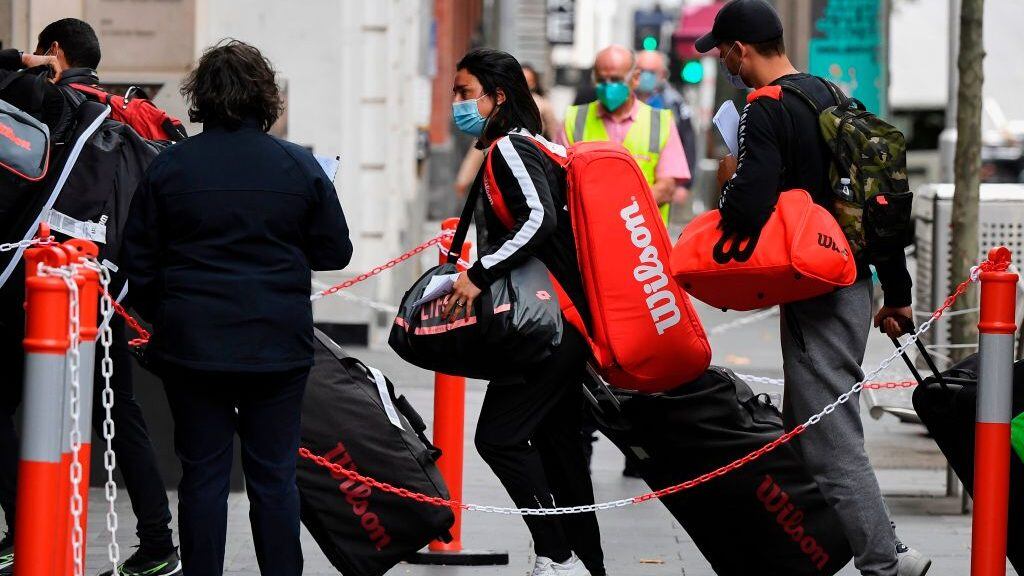 Tennis players, coaches and officials arrive at a hotel in Melbourne on January 15, 2021, before quarantining for two weeks ahead of the Australian Open tennis tournament. (Photo by William WEST / AFP) (Photo by WILLIAM WEST/AFP via Getty Images)