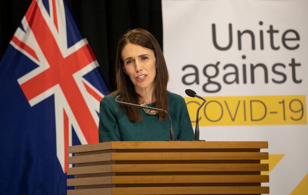 WELLINGTON, NEW ZEALAND - APRIL 06: Prime Minister Jacinda Ardern speaks during her post-Cabinet media update at Parliament on April 6, 2020 in Wellington, New Zealand. New Zealand has been in lockdown since Thursday 26 March following tough restrictions imposed by the government to stop the spread of COVID-19 across the country. A State of National Emergency is in place along with an Epidemic Notice to help ensure the continuity of essential Government business. Under the COVID-19 Alert Level Four measures, all non-essential businesses are closed, including bars, restaurants, cinemas and playgrounds. Schools are closed and all indoor and outdoor events are banned. Essential services will remain open, including supermarkets and pharmacies. Lockdown measures are expected to remain in place for around four weeks, with Prime Minister Jacinda Ardern warning there will be zero tolerance for people ignoring the restrictions, with police able to enforce them if required. (Photo by Mark Mitchell - Pool/Getty Images)