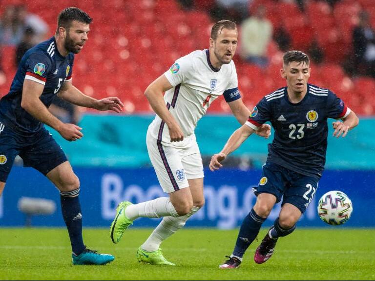 ENGLAND, SCOTLAND - JUNE 18: Scotland's Grant Hanley (left) and Billy Gilmour hold off England's Harry Kane during a Euro 2020 match between England and Scotland at Wembley Stadium, on June 18, 2021, in London, England. (Photo by Craig Williamson/SNS Group via Getty Images)