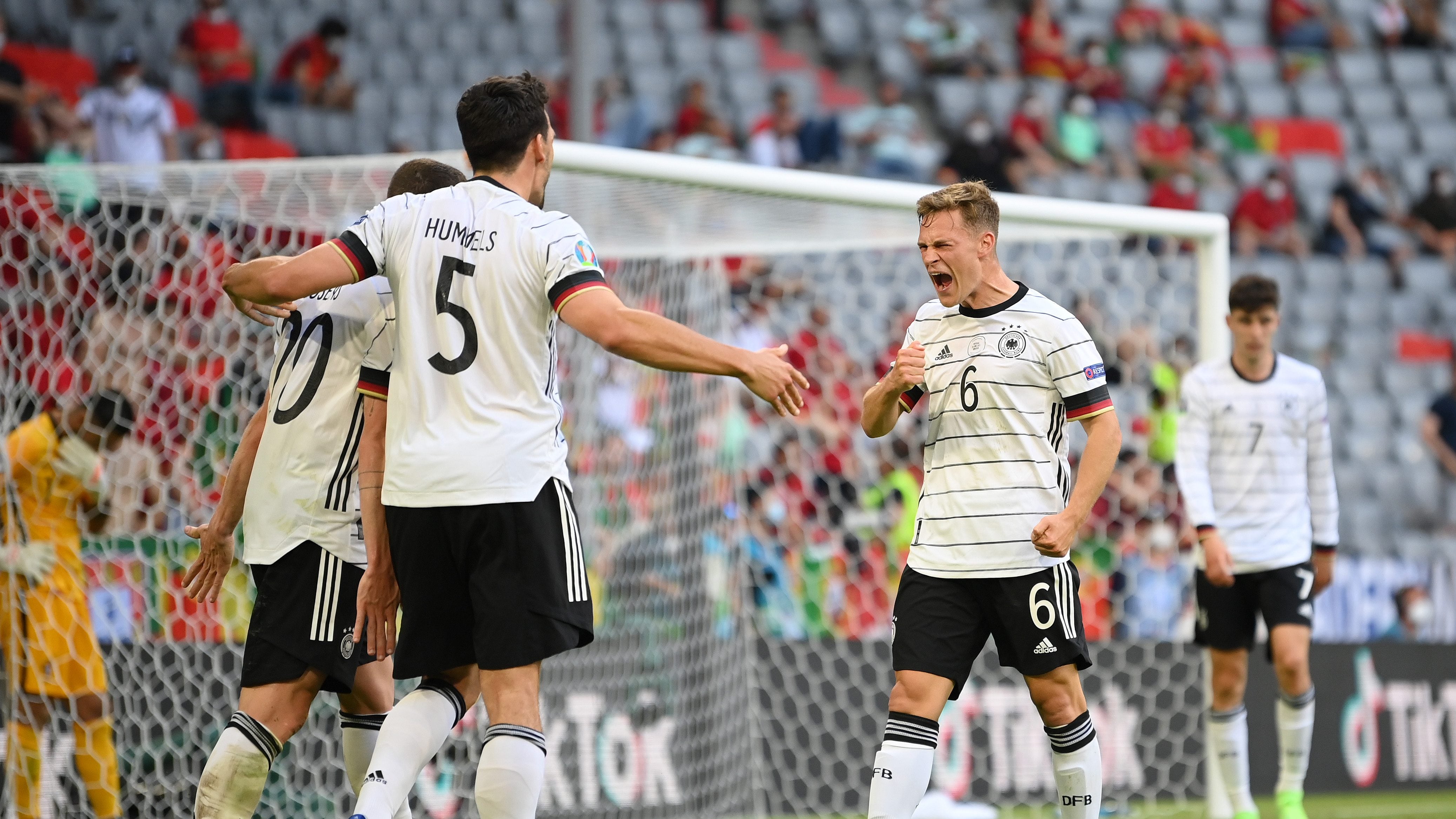 MUNICH, GERMANY - JUNE 19: Robin Gosens of Germany celebrates with Mats Hummels and Joshua Kimmich after scoring their side's fourth goal during the UEFA Euro 2020 Championship Group F match between Portugal and Germany at Football Arena Munich on June 19, 2021 in Munich, Germany. (Photo by Sebastian Widmann - UEFA/UEFA via Getty Images)