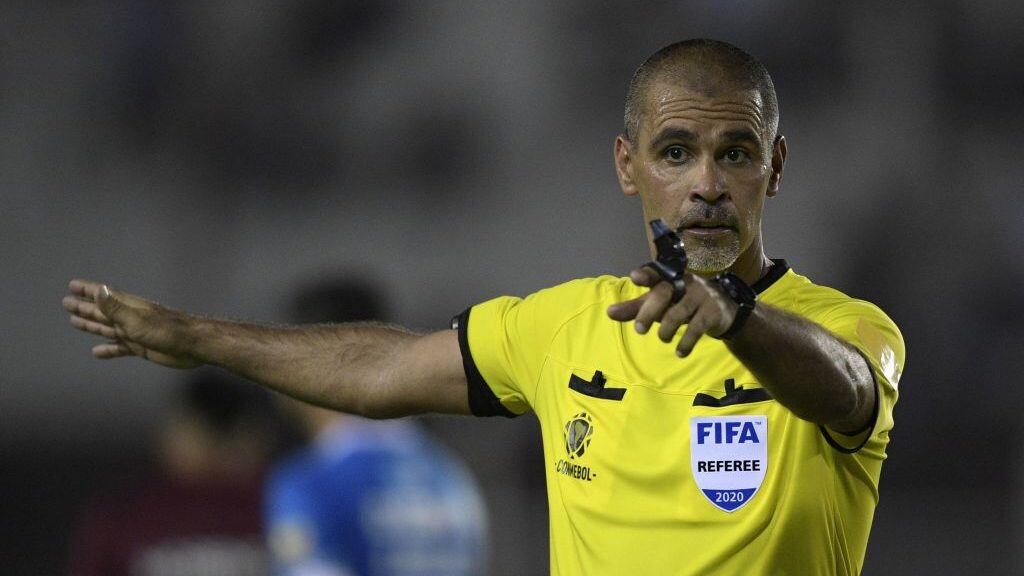Paraguayan referee Eber Aquino gestures during the Copa Sudamericana first stage first leg football match between Argentina's Lanus and Ecuador's Universidad Catolica at "La Fortaleza" stadium in Lanus, Buenos Aires, Argentina, on February 12, 2020. (Photo by JUAN MABROMATA / AFP) (Photo by JUAN MABROMATA/AFP via Getty Images)