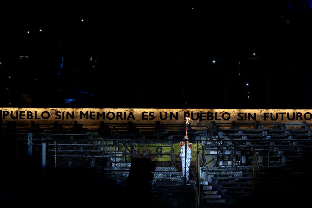 SANTIAGO, CHILE - OCTOBER 20: Chilean swimmer Kristel Köbrich holds the Pan American torch during the opening ceremony of the Santiago 2023 Pan Am Games at Estadio Nacional Julio Martínez Prádanos on October 20, 2023 in Santiago, Chile. (Photo by Buda Mendes/Getty Images)