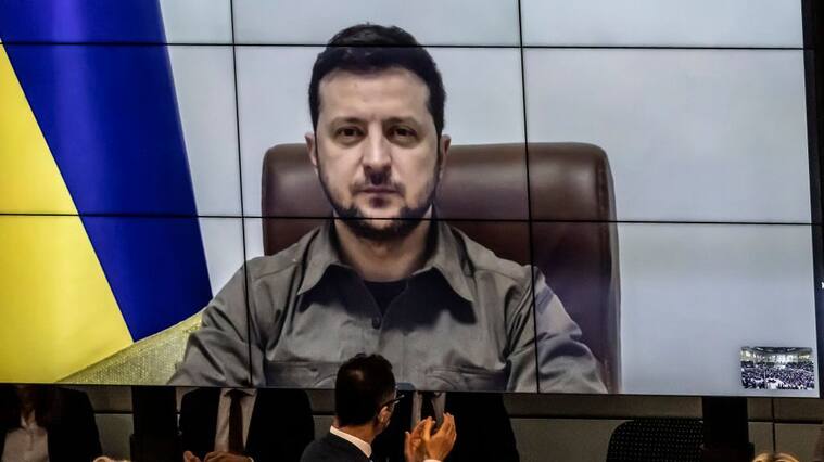 BERLIN, GERMANY - MARCH 17: Ukrainian President Volodymyr Zelensky addresses the Bundestag via live video from the embattled city of Kyiv on March 17, 2022 in Berlin, Germany. Zelensky has been pleading NATO member states to enforce a no-fly zone over Ukraine, which NATO has so far declined, citing the need to avoid a direct military confrontation with Russia. (Photo by Hannibal Hanschke/Getty Images)