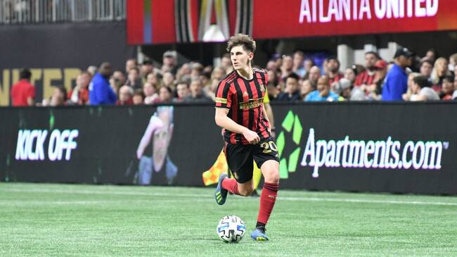 ATLANTA, GA - MARCH 07: Atlanta United midfielder Emerson Hyndman #20 dribbles the ball during the match against FC Cincinnati, which Atlanta won, 2-1, in front of a crowd of 69,301 at Mercedes-Benz Stadium during a game between FC Cincinnati and Atlanta United FC at Mercedes-Benz Stadium on March 07, 2020 in Atlanta, Georgia. (Photo by Perry McIntyre/ISI Photos/Getty Images)