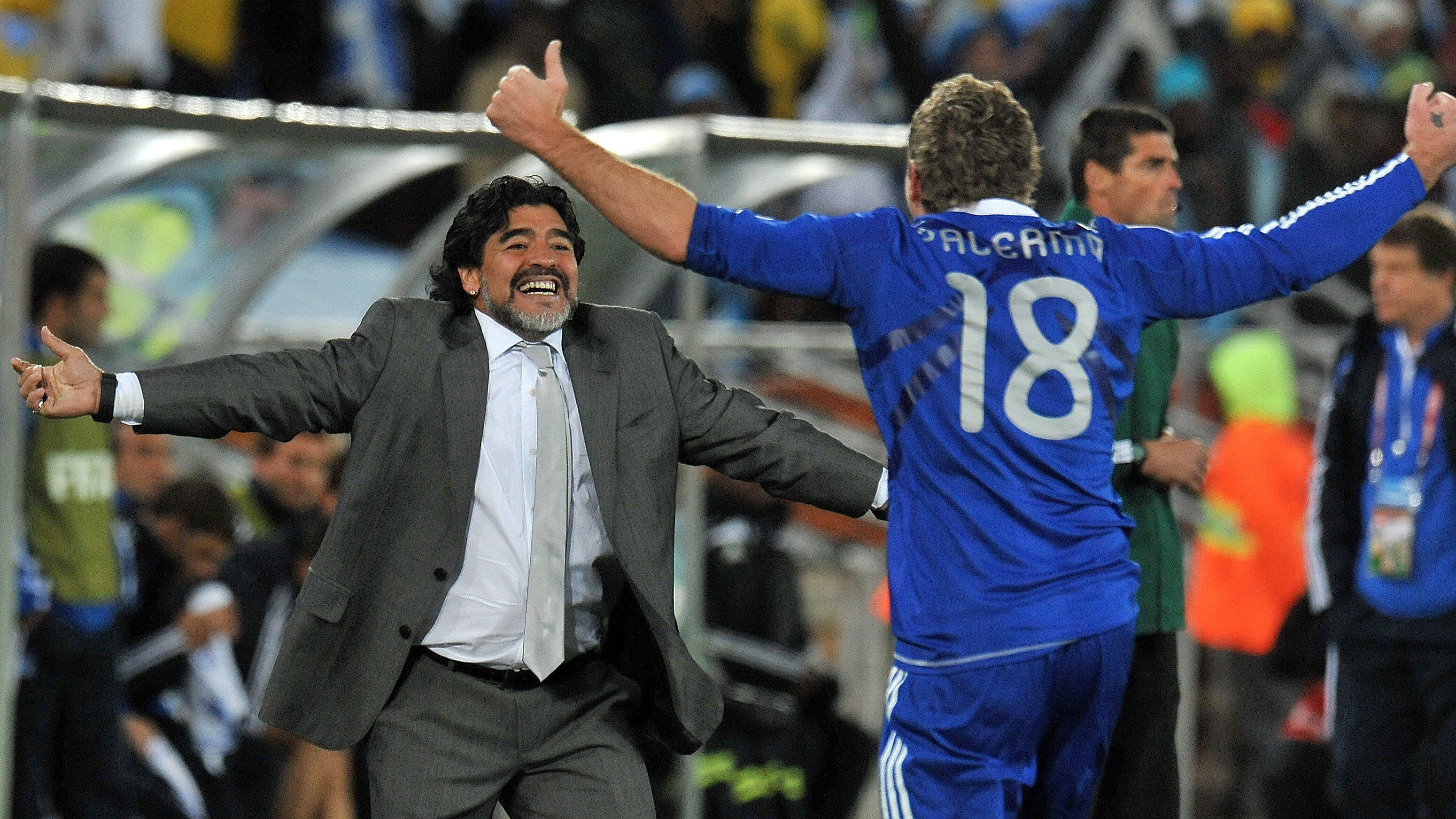 POLOKWANE, SOUTH AFRICA - JUNE 22: Martin Palermo of Argentina celebrates after scoring his team second goal with Diego Armando Maradona head coach of Argentina during the FIFA World Cup 2010 Group B match between Grecee and Argentina at Peter Mokaba Stadium on June 22, 2010 in Polokwane, South Africa. (Photo by Alessandro Sabattini/Getty Images)