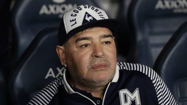 Argentine former football star Diego Maradona gestures during an homage before the start of the Argentina First Division 2020 Superliga Tournament football match Boca Juniors vs Gimnasia La Plata, at La Bombonera stadium, in Buenos Aires, on March 7, 2020. (Photo by ALEJANDRO PAGNI / AFP) (Photo by ALEJANDRO PAGNI/AFP via Getty Images)