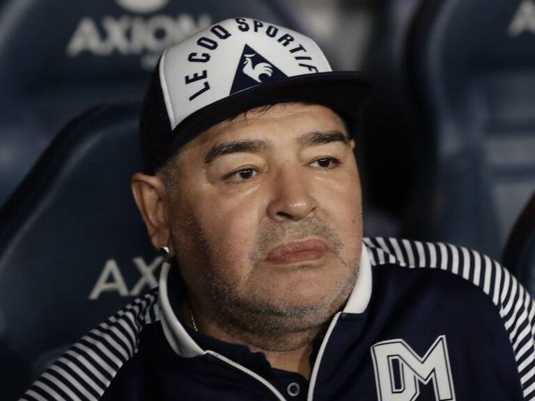 Argentine former football star Diego Maradona gestures during an homage before the start of the Argentina First Division 2020 Superliga Tournament football match Boca Juniors vs Gimnasia La Plata, at La Bombonera stadium, in Buenos Aires, on March 7, 2020. (Photo by ALEJANDRO PAGNI / AFP) (Photo by ALEJANDRO PAGNI/AFP via Getty Images)
