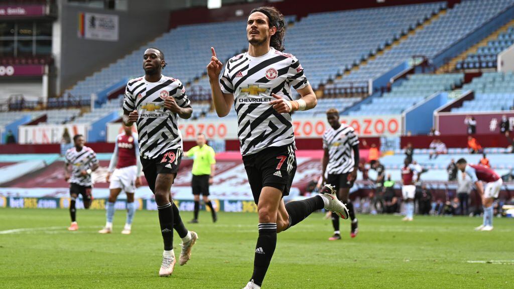 BIRMINGHAM, ENGLAND - MAY 09: Edinson Cavani of Manchester United celebrates after scoring their side's third goal during the Premier League match between Aston Villa and Manchester United at Villa Park on May 09, 2021 in Birmingham, England. Sporting stadiums around the UK remain under strict restrictions due to the Coronavirus Pandemic as Government social distancing laws prohibit fans inside venues resulting in games being played behind closed doors. (Photo by Shaun Botterill/Getty Images)