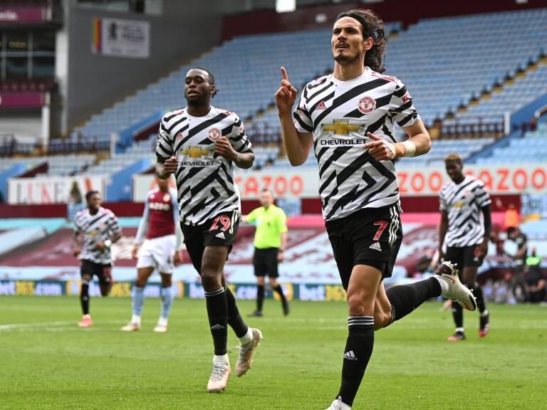 BIRMINGHAM, ENGLAND - MAY 09: Edinson Cavani of Manchester United celebrates after scoring their side's third goal during the Premier League match between Aston Villa and Manchester United at Villa Park on May 09, 2021 in Birmingham, England. Sporting stadiums around the UK remain under strict restrictions due to the Coronavirus Pandemic as Government social distancing laws prohibit fans inside venues resulting in games being played behind closed doors. (Photo by Shaun Botterill/Getty Images)