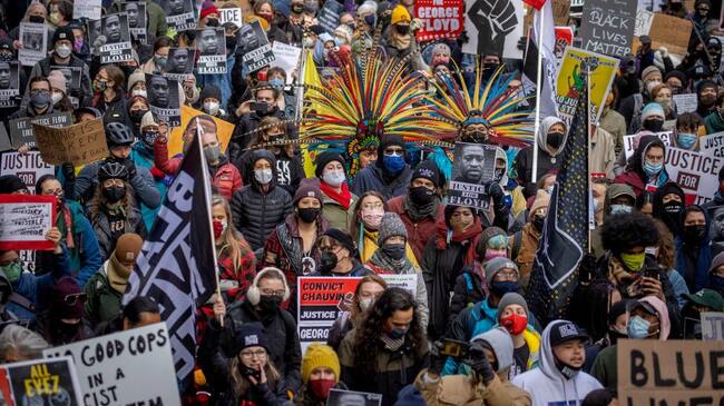 MINNEAPOLIS, MN - APRIL 19: Protesters marched after the case went to the jury at the Hennepin Government Center, Monday, April 19, 2021 in Minneapolis. Trial coverage of former Minneapolis police officer Derek Chauvin in the death of George Floyd. (Photo by Elizabeth Flores/Star Tribune via Getty Images)
