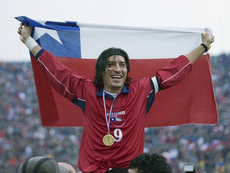 Ivan Zamorano (Chile) is held aloft after a friendly match against France. Chile won 2-1. (Photo by Stephane Reix/Corbis/VCG via Getty Images)