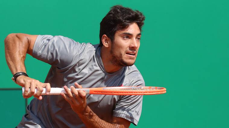 Chile's Christian Garin rund for the ball during his third round singles match against Greece's Stefanos Tsitsipas on day six of the Monte-Carlo ATP Masters Series tournament in Monaco on April 15, 2021. (Photo by Valery HACHE / AFP) (Photo by VALERY HACHE/AFP via Getty Images)