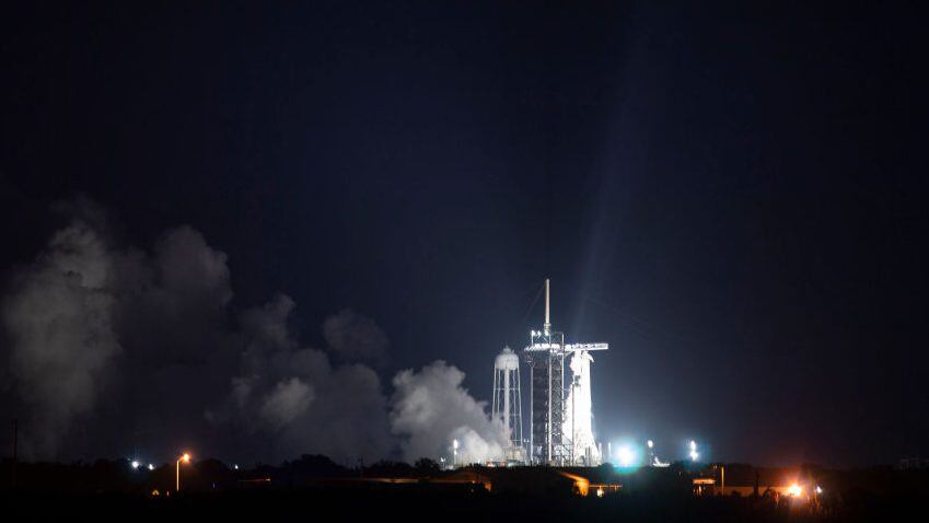 CAPE CANAVERAL, FLORIDA - APRIL 17: A SpaceX Falcon 9 rocket with the company's Crew Dragon spacecraft onboard is seen on the launch pad at Launch Complex 39A during a brief static fire test ahead of NASAs SpaceX Crew-2 mission on April 17, 2021 at NASA's Kennedy Space Center in Cape Canaveral, Florida. NASAs SpaceX Crew-2 mission is the second crew rotation mission of the SpaceX Crew Dragon spacecraft and Falcon 9 rocket to the International Space Station as part of the agencys Commercial Crew Program. NASA astronauts Shane Kimbrough and Megan McArthur, ESA (European Space Agency) astronaut Thomas Pesquet, and Japan Aerospace Exploration Agency (JAXA) astronaut Akihiko Hoshide are scheduled to launch at 6:11 a.m. ET on Thursday, April 22, from Launch Complex 39A at the Kennedy Space Center. (Photo by Joel Kowsky/NASA via Getty Images)