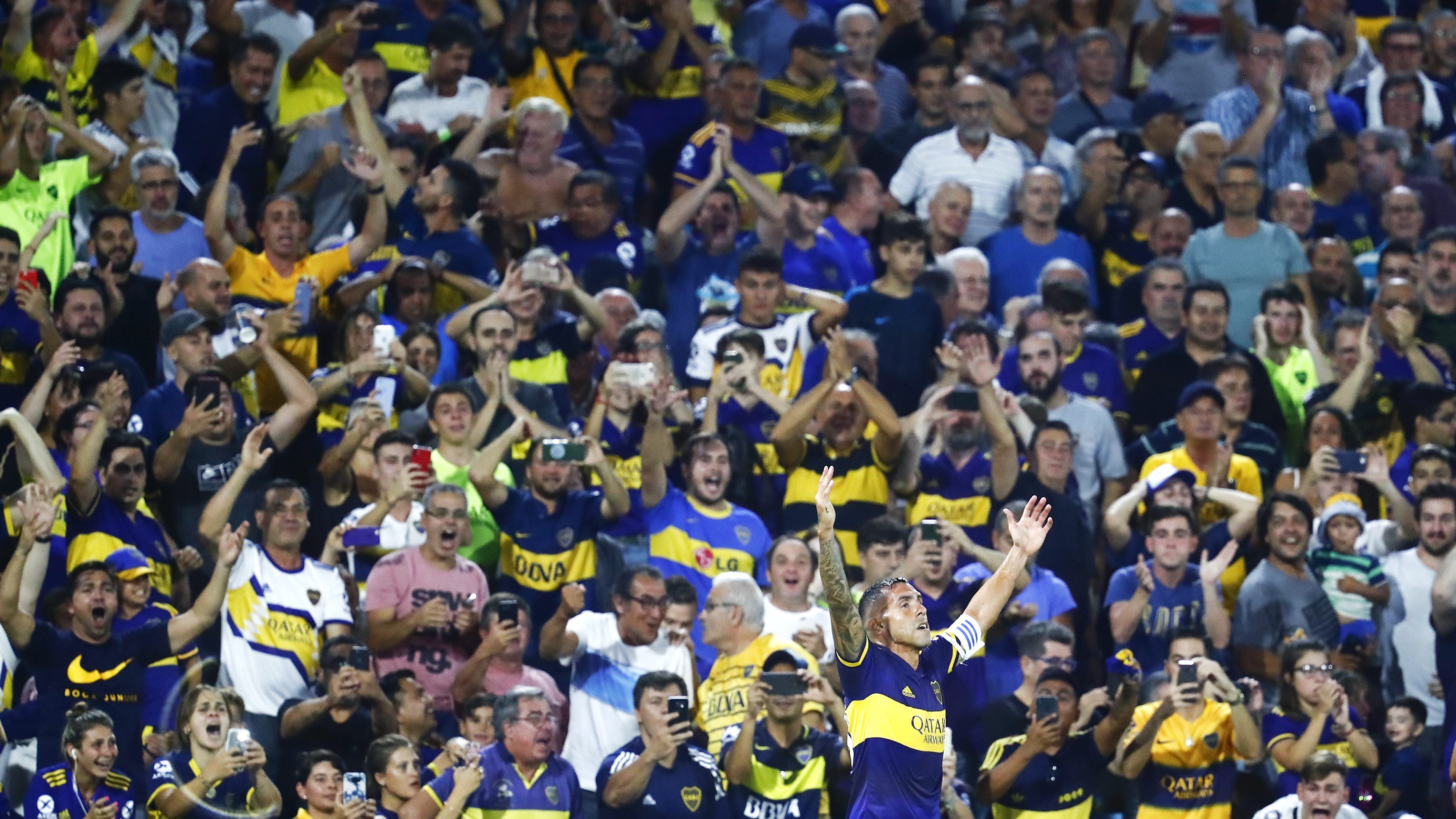 BUENOS AIRES, ARGENTINA - MARCH 07: Carlos Tevez of Boca Juniors celebrates after scoring the first goal of his team during a match between Boca Juniors and Gimnasia y Esgrima La Plata as part of Superliga 2019/20 at Alberto J. Armando Stadium on March 7, 2020 in Buenos Aires, Argentina. (Photo by Marcos Brindicci/Getty Images)