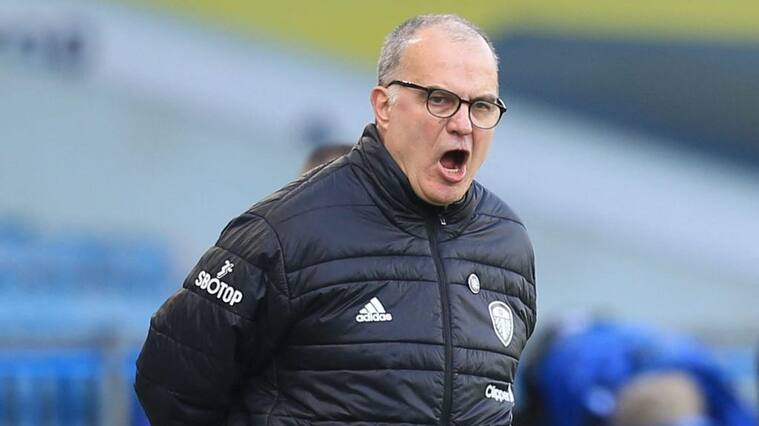 Leeds United's Argentinian head coach Marcelo Bielsa reacts during the English Premier League football match between Leeds United and Sheffield United at Elland Road in Leeds, northern England on April 3, 2021. - RESTRICTED TO EDITORIAL USE. No use with unauthorized audio, video, data, fixture lists, club/league logos or 'live' services. Online in-match use limited to 120 images. An additional 40 images may be used in extra time. No video emulation. Social media in-match use limited to 120 images. An additional 40 images may be used in extra time. No use in betting publications, games or single club/league/player publications. (Photo by Lindsey Parnaby / POOL / AFP) / RESTRICTED TO EDITORIAL USE. No use with unauthorized audio, video, data, fixture lists, club/league logos or 'live' services. Online in-match use limited to 120 images. An additional 40 images may be used in extra time. No video emulation. Social media in-match use limited to 120 images. An additional 40 images may be used in extra time. No use in betting publications, games or single club/league/player publications. / RESTRICTED TO EDITORIAL USE. No use with unauthorized audio, video, data, fixture lists, club/league logos or 'live' services. Online in-match use limited to 120 images. An additional 40 images may be used in extra time. No video emulation. Social media in-match use limited to 120 images. An additional 40 images may be used in extra time. No use in betting publications, games or single club/league/player publications. (Photo by LINDSEY PARNABY/POOL/AFP via Getty Images)