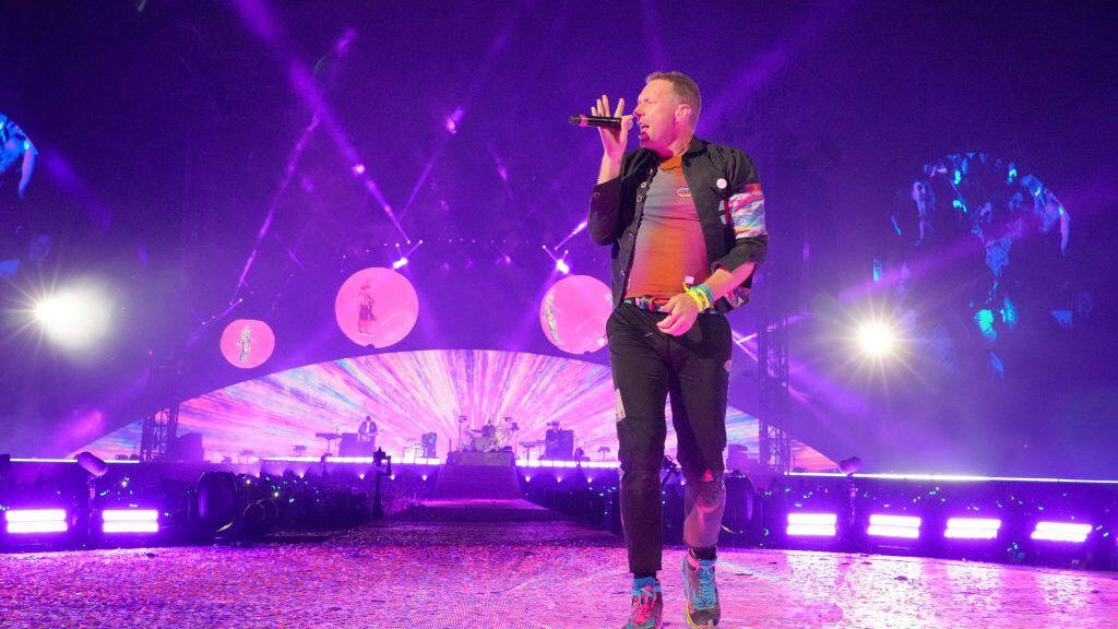 DALLAS, TEXAS - MAY 06: Chris Martin of Coldplay performs onstage during their "Music of the Spheres" tour at Cotton Bowl on May 06, 2022 in Dallas, Texas. (Photo by Kevin Mazur/Getty Images for Atlantic Records )