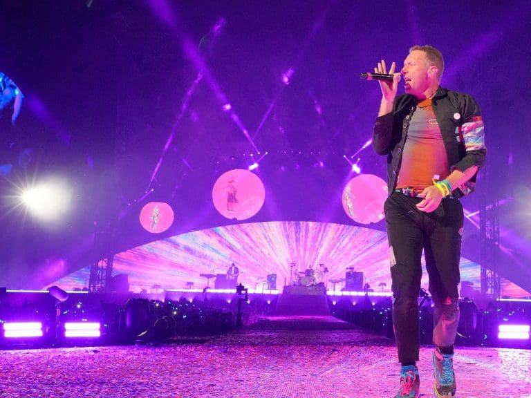DALLAS, TEXAS - MAY 06:  Chris Martin of Coldplay performs onstage during their &quot;Music of the Spheres&quot; tour at Cotton Bowl on May 06, 2022 in Dallas, Texas. (Photo by Kevin Mazur/Getty Images for Atlantic Records )